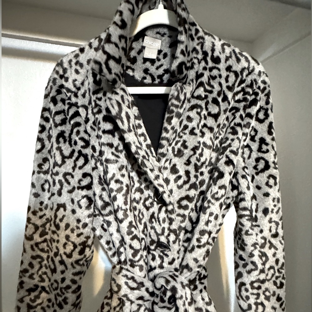 Black and grey leopard furry car coat with pockets and belt.